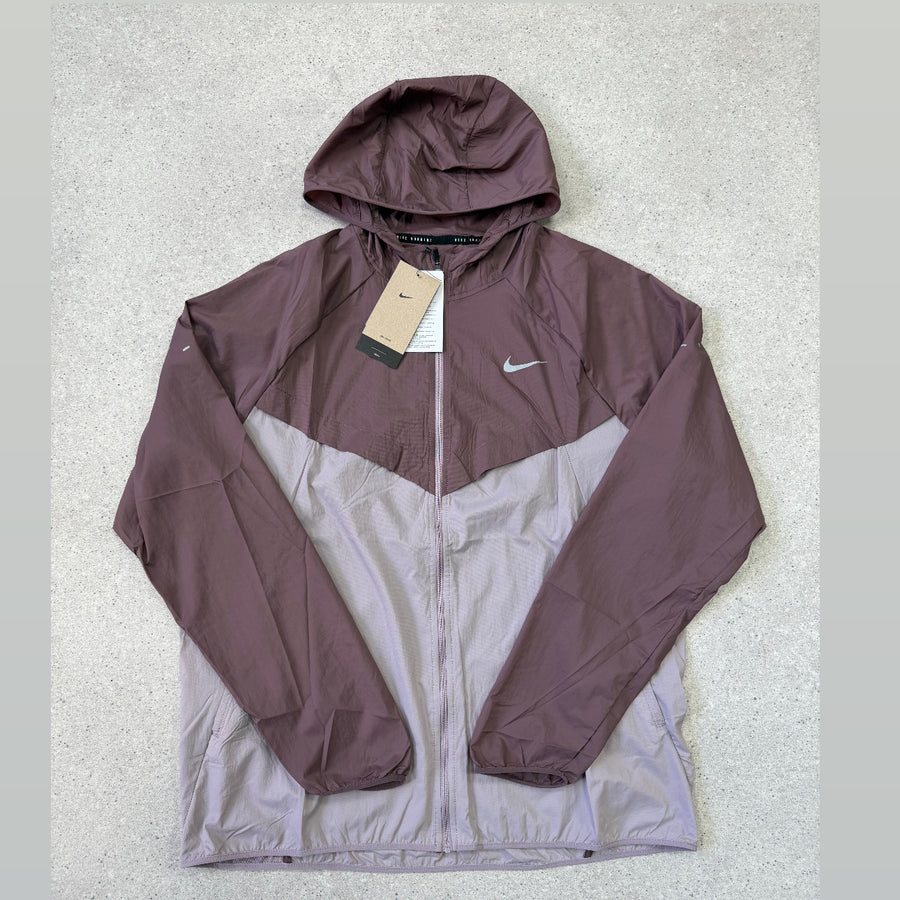 Nike Running Stride Repel jacket in burgundy and light purple